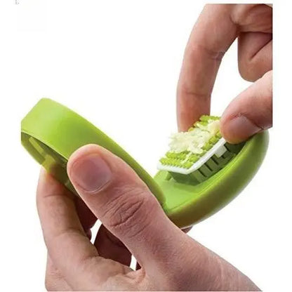 Effortless Garlic Mincer & Press - Manual Stainless Steel Chopper with Handy Storage Container in Vibrant Green